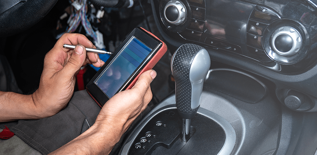 man using obd2 scanner